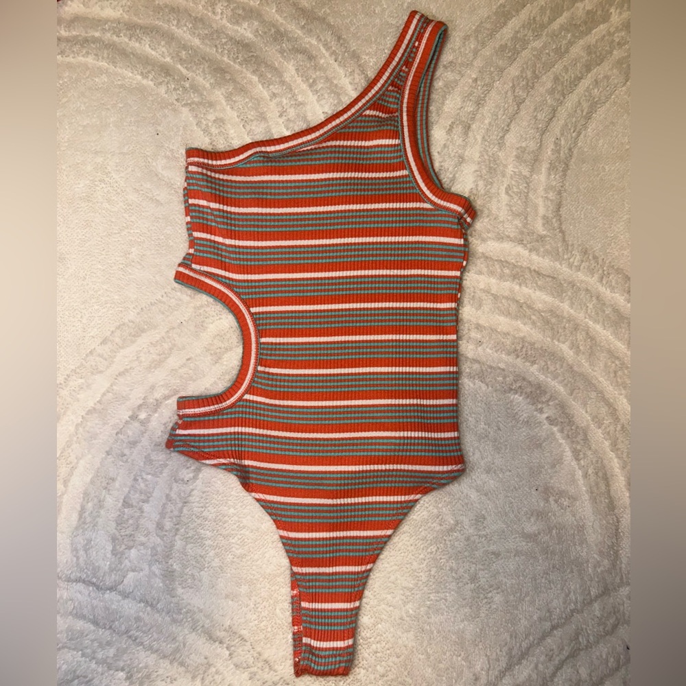 Orange, white, and blue striped body suit